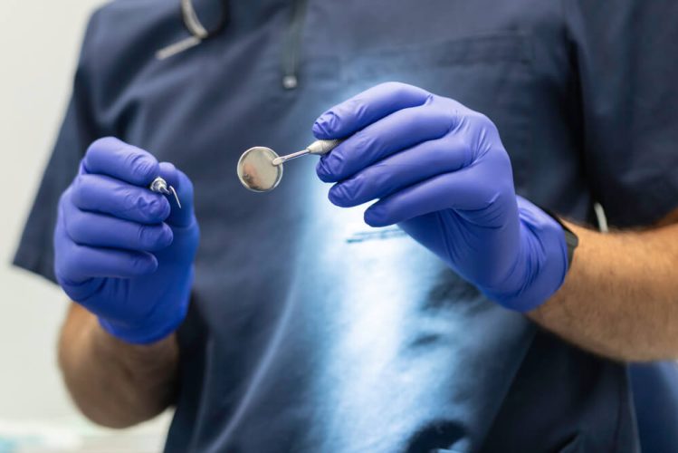 newmarket family dental dentist preparing for emergency dental procedure newmarket family dental dentist preparing for emergency dental procedure